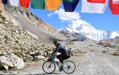 Ali Gillum Cycling on the  tour with redspokes